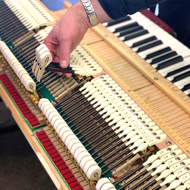 3D printed replacement parts in a grand piano