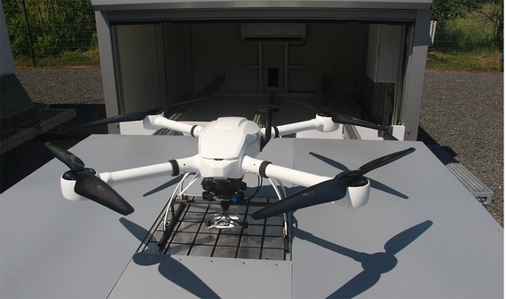 Drone hangar with platform